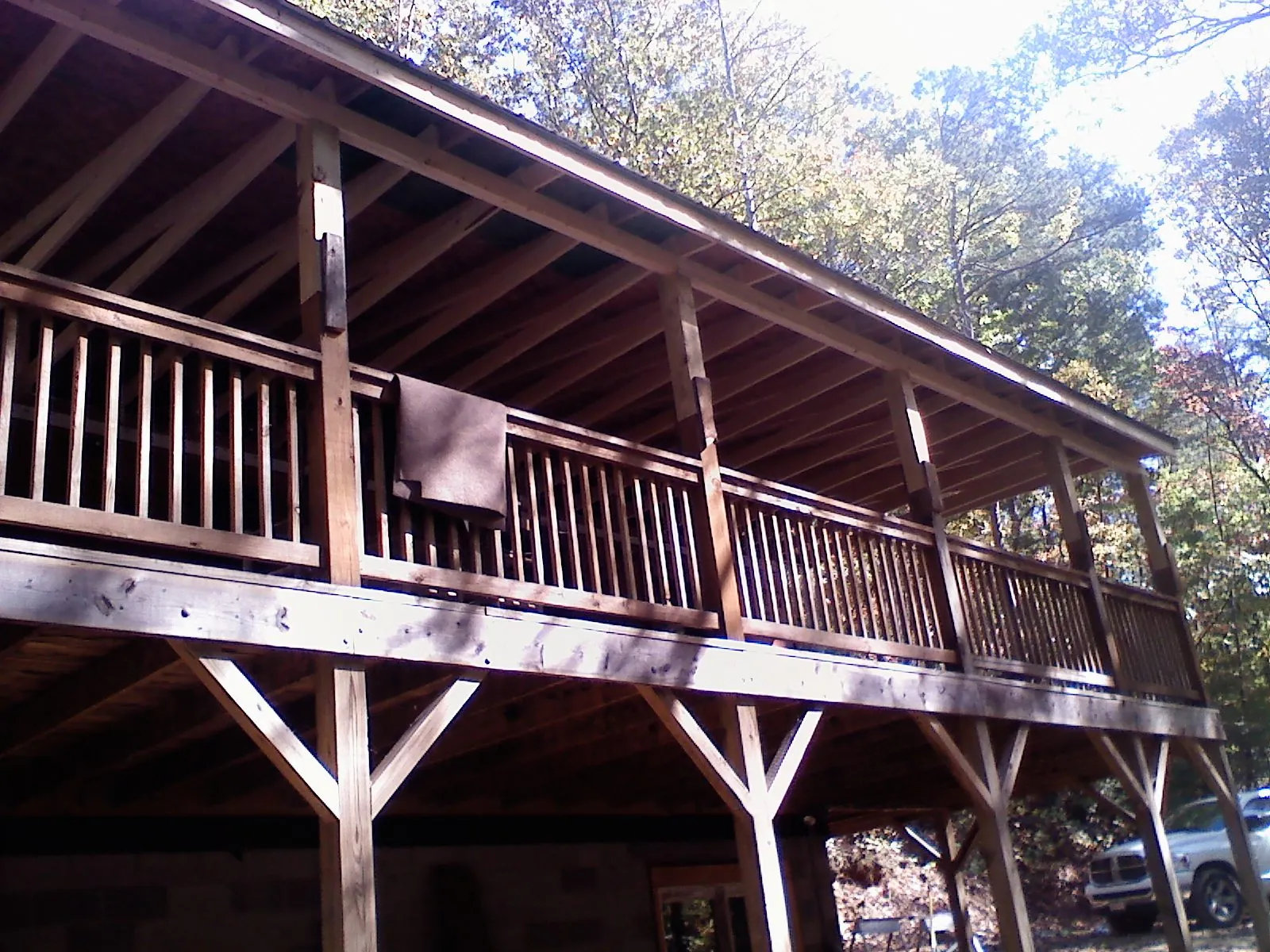 Timber framing under a new elevated porch and deck — Roof Leak Repair in West Edmeston by Roofing Brothers